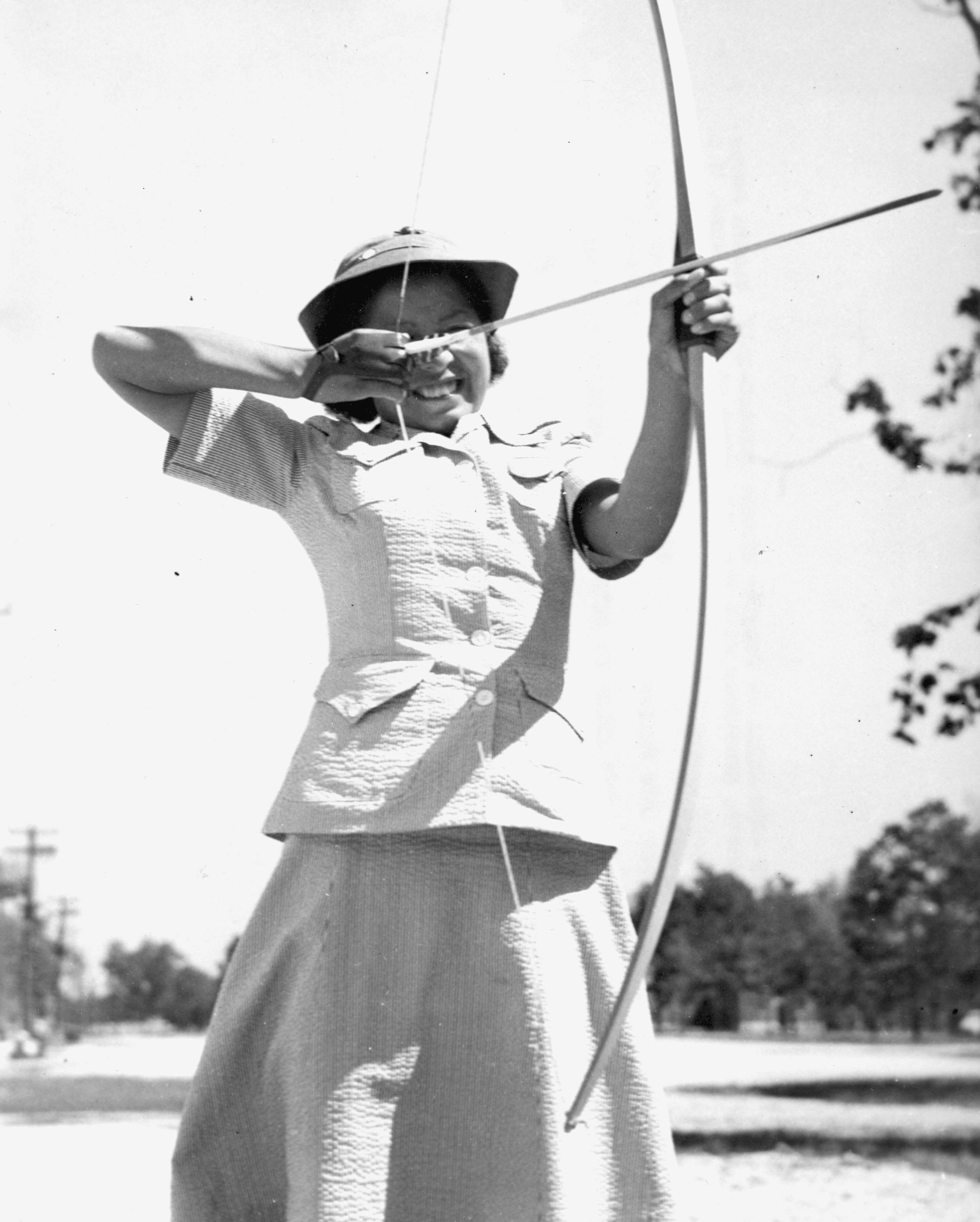 Marine Private Practices with Bow and Arrow – Women of World War II